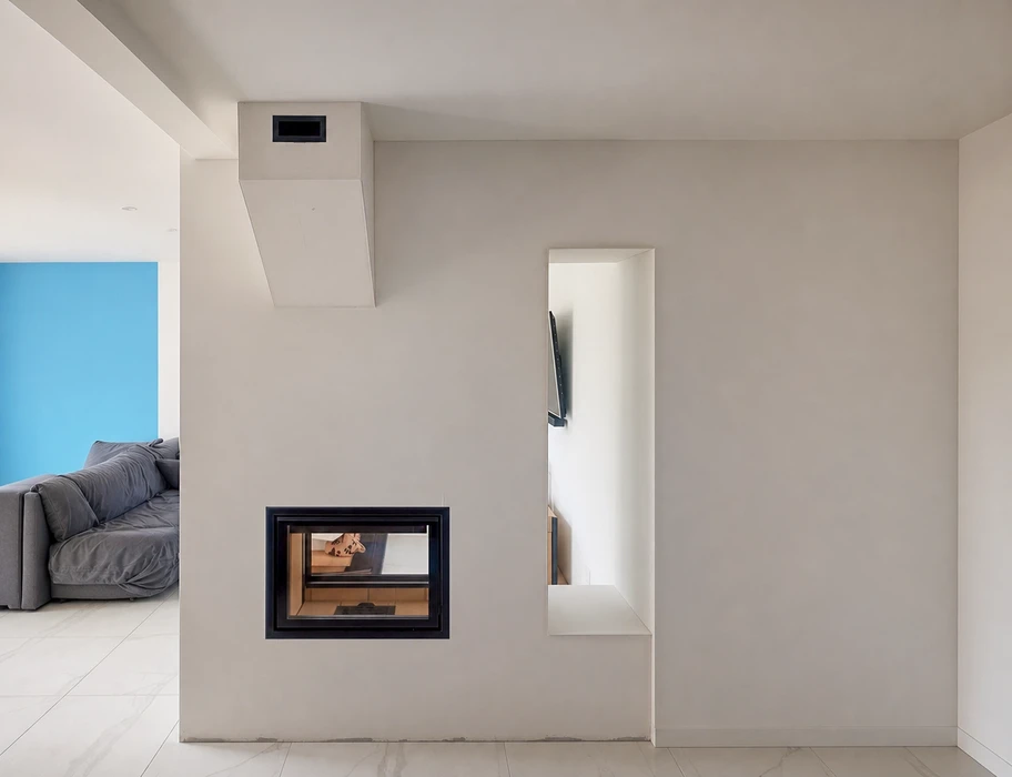 Intérieur moderne minimaliste avec cheminée double face encastrée à cadre noir et foyer en céramique réfractaire